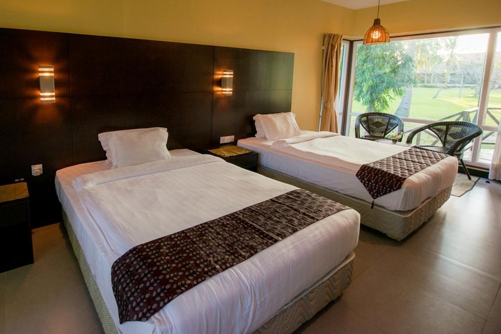 Raintree Beach And Golf Resort Tuaran Room photo